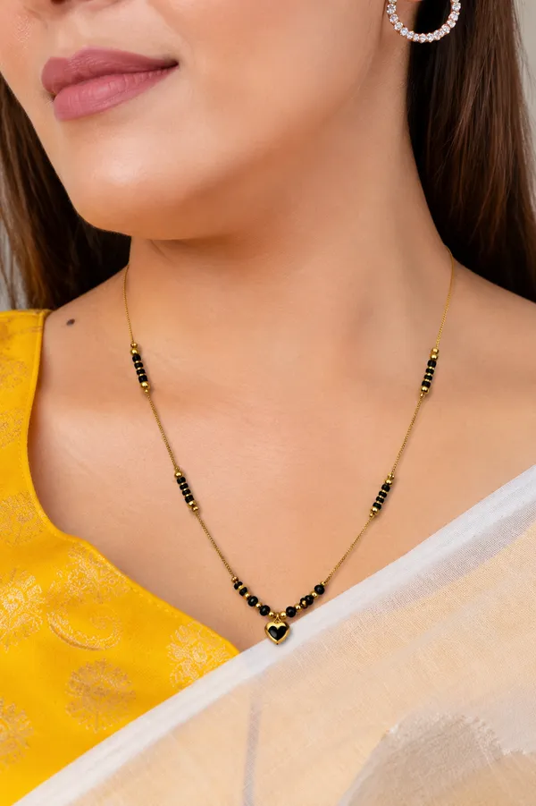 Gold_Alloy_With_Black_Beads_Heart_Pendant_Mangalsutra_For_Women