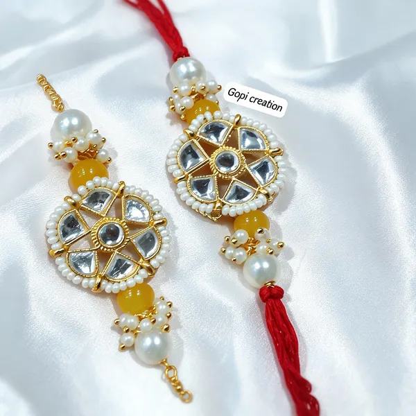Yellow_Rakhi,_Lumba,_Bracelet,_Bluetooth_Rakhi,_Chawal_Roli_Pack_Alloy_For_Brother_And_Sister-In-Law_Pack_Of_2