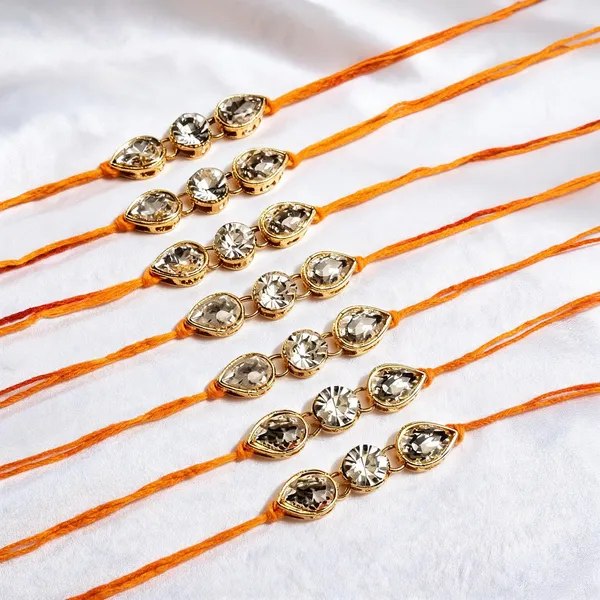 White_And_Yellow_Rakhi,_Lumba,_Bracelet_Alloy_For_Brother_And_Sister-In-Law_Pack_Of_2