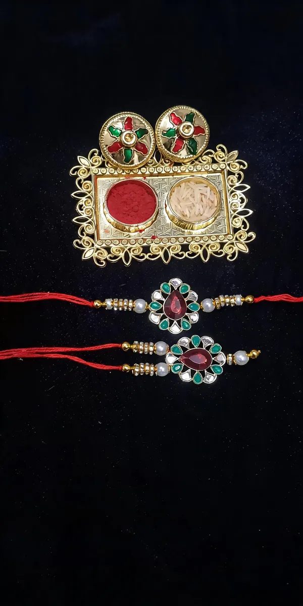 Green_And_White_Rakhi,_Lumba,_Bracelet,_Chawal_Roli_Pack_Alloy_For_Brother_And_Sister-In-Law_Pack_Of_2