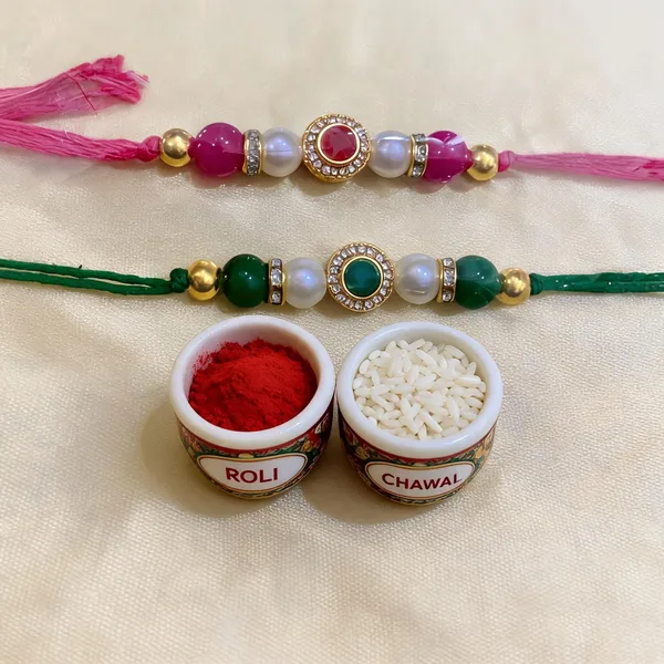 Green_And_Dark_Pink_Rakhi,_Lumba,_Bracelet,_Chawal_Roli_Pack_Alloy_For_Brother_And_Sister-In-Law_Pack_Of_2
