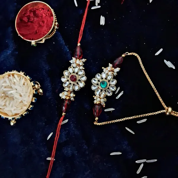 Red_And_Green_Rakhi,_Lumba,_Bracelet,_Chawal_Roli_Pack_Alloy_For_Brother_And_Sister-In-Law_Pack_Of_2
