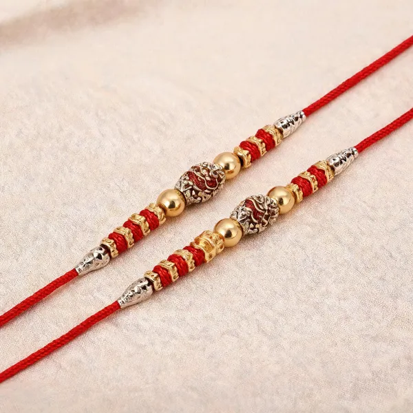 Red_N_Dark_Gold_Rakhi,_Bracelet_Alloy_For_Women_And_Men_Pack_Of_2