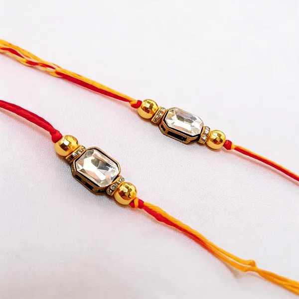 Red_N_Light_Yellow_Rakhi,_Bracelet_Alloy_For_Women_And_Men_Pack_Of_2