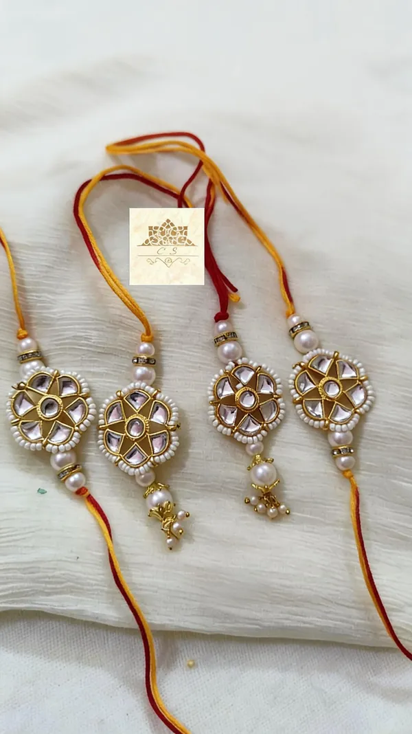 White_N_Red_Rakhi,_Bracelet_Alloy_For_Brother_And_Sister-In-Law_Pack_Of_2