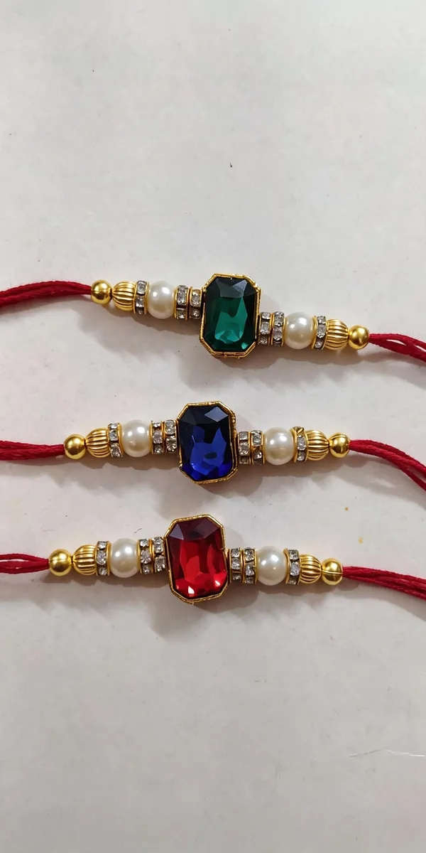 Multi_Red_N_White_Rakhi,_Bracelet_Alloy_For_Religious_Occasion_Pack_Of_2