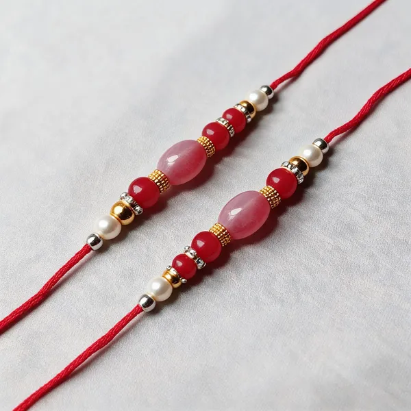 Red_N_Light_Pink_Rakhi,_Bracelet_Alloy_For_Religious_Occasion_Pack_Of_2