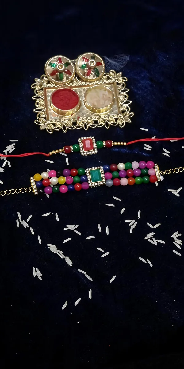 Dark_Multi_Rakhi,_Bracelet,_Thali_Alloy_For_Brother_And_Sister-In-Law_Pack_Of_2