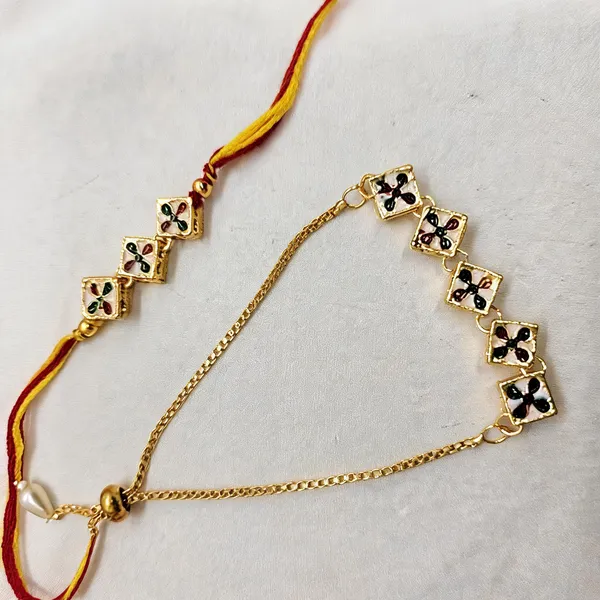 White_And_Red_Rakhi,_Bracelet_Alloy_For_Brother_And_Sister-In-Law_Pack_Of_1