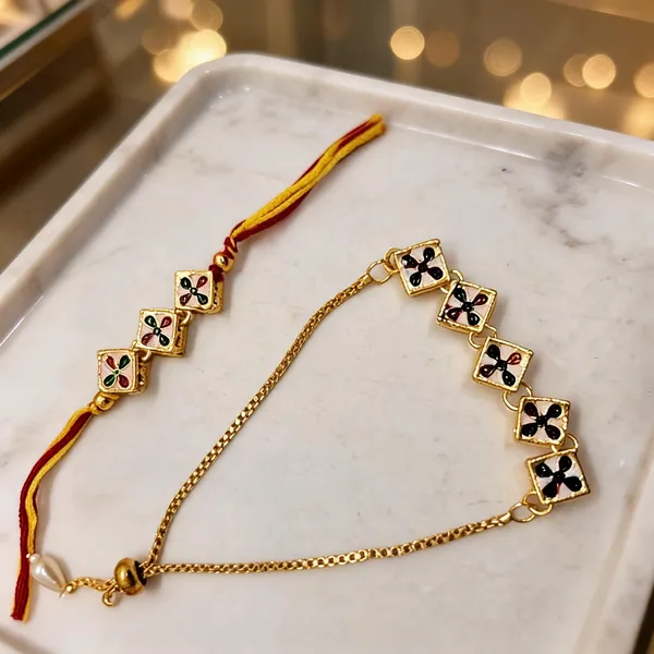 White_And_Red_Rakhi,_Bracelet_Alloy_For_Brother_And_Sister-In-Law_Pack_Of_1