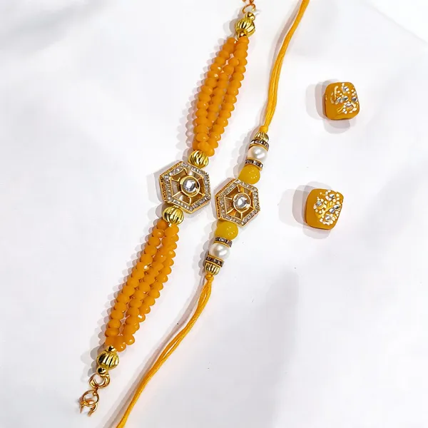 Yellow_And_Golden_Rakhi,_Bracelet,_Chawal_Roli_Pack_Alloy_For_Brother_And_Sister-In-Law_Pack_Of_2