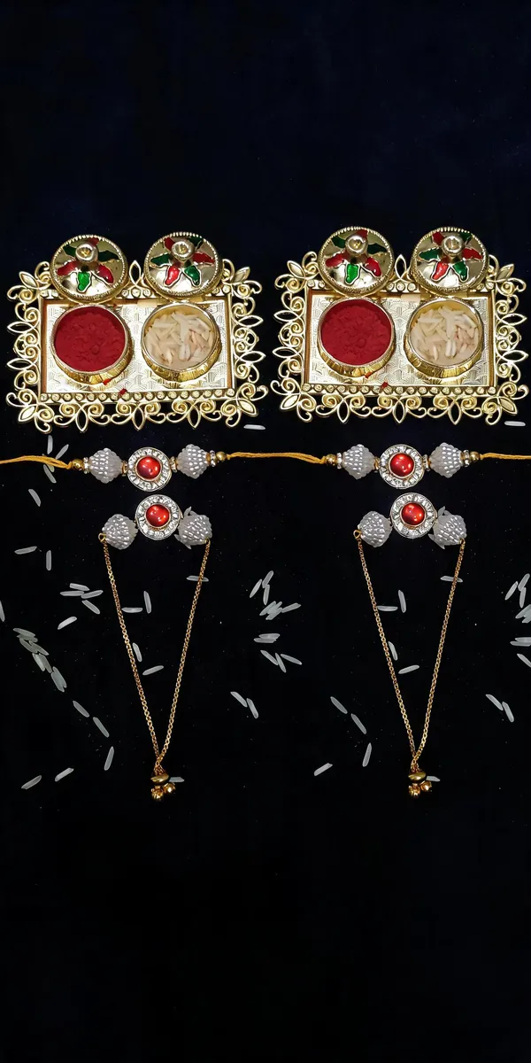 Red_And_White_Rakhi,_Lumba,_Bracelet,_Chawal_Roli_Pack_Alloy_For_Brother_And_Sister-In-Law_Pack_Of_2