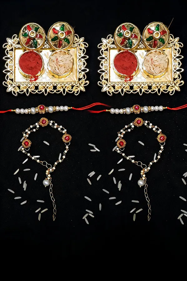 Red_And_White_Rakhi,_Lumba,_Bracelet,_Chawal_Roli_Pack_Alloy_For_Brother_And_Sister-In-Law_Pack_Of_2