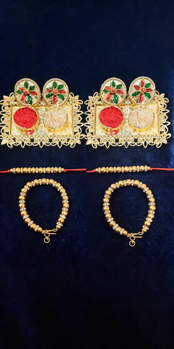 White_And_Golden_Rakhi,_Lumba,_Bracelet,_Chawal_Roli_Pack_Alloy_For_Brother_And_Sister-In-Law_Pack_Of_2