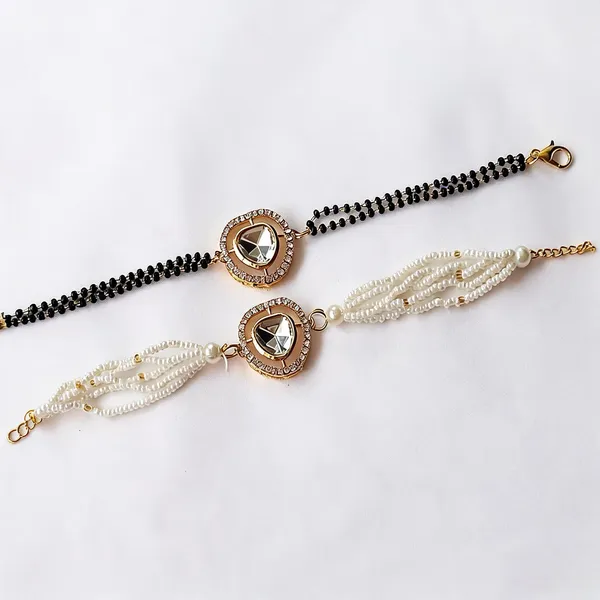 White_And_Golden_Rakhi,_Bracelet_Alloy_For_Brother_And_Sister-In-Law_Pack_Of_2