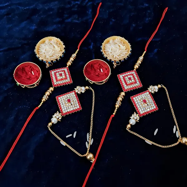 Red_And_White_Rakhi,_Lumba,_Bracelet,_Chawal_Roli_Pack_Alloy_For_Brother_And_Sister-In-Law_Pack_Of_2