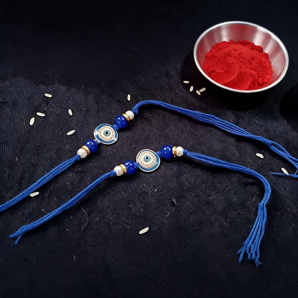 Blue_And_White_Rakhi,_Lumba,_Bracelet,_Chawal_Roli_Pack_Alloy_For_Brother_And_Sister-In-Law_Pack_Of_2