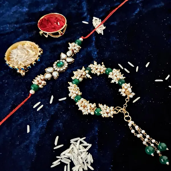 Green_And_White_Rakhi,_Lumba,_Bracelet,_Chawal_Roli_Pack_Alloy_For_Brother_And_Sister-In-Law_Pack_Of_2