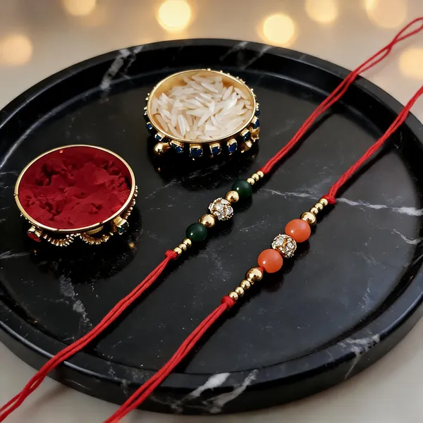 Orange_And_Green_Rakhi,_Lumba,_Bracelet,_Chawal_Roli_Pack_Alloy_For_Brother_And_Sister-In-Law_Pack_Of_2