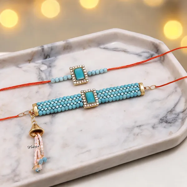Sky_Blue_And_White_Rakhi,_Bracelet_Alloy_For_Brother_And_Sister-In-Law_Pack_Of_2
