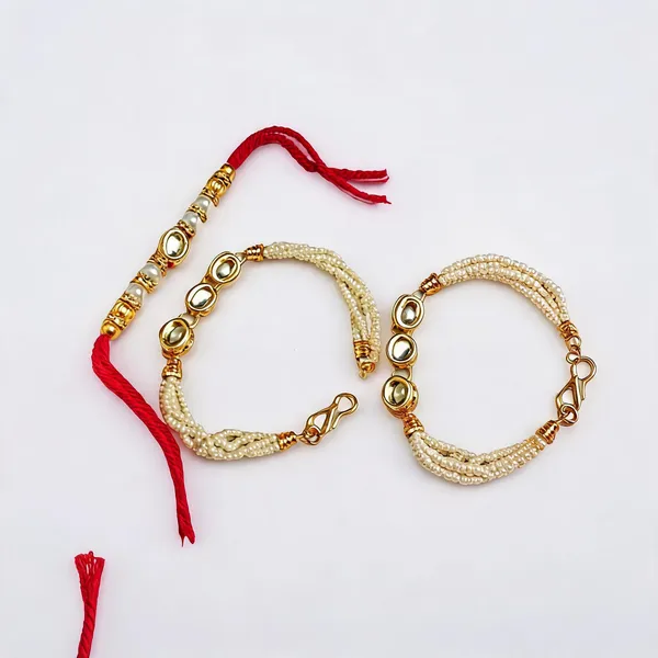 White_And_Red_Rakhi,_Lumba_Alloy_For_Brother_And_Sister-In-Law_Pack_Of_2