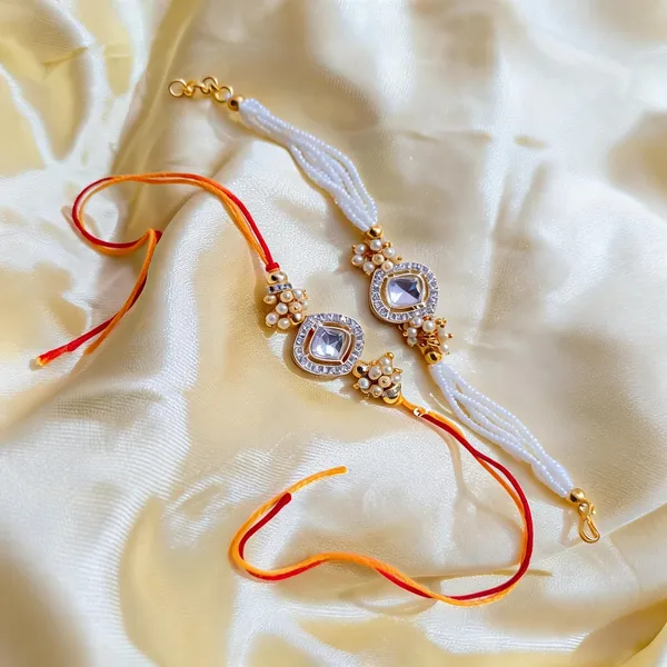 White_And_Multicolor_Rakhi,_Bracelet_Alloy_For_Brother_And_Sister-In-Law_Pack_Of_2