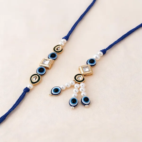 Blue_And_White_Rakhi,_Lumba,_Bracelet_Alloy_For_Brother_And_Sister-In-Law_Pack_Of_1