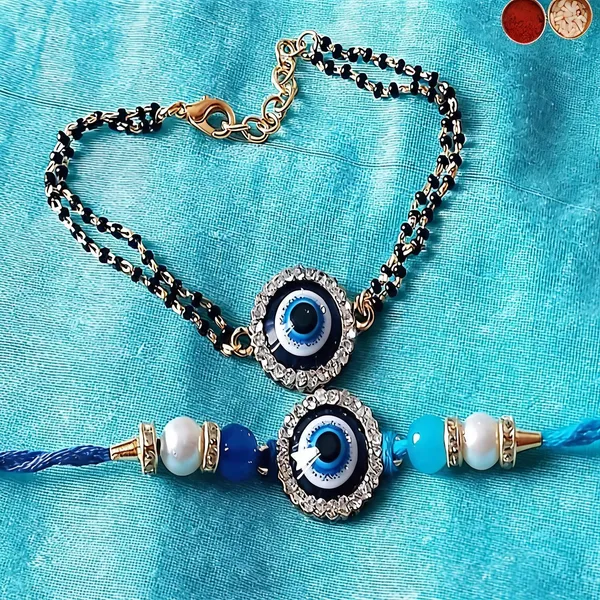 Blue_And_White_And_Black_Rakhi,_Lumba,_Bracelet,_Bluetooth_Rakhi,_Chawal_Roli_Pack_Alloy_For_Brother_And_Sister-In-Law_Pack_Of_2