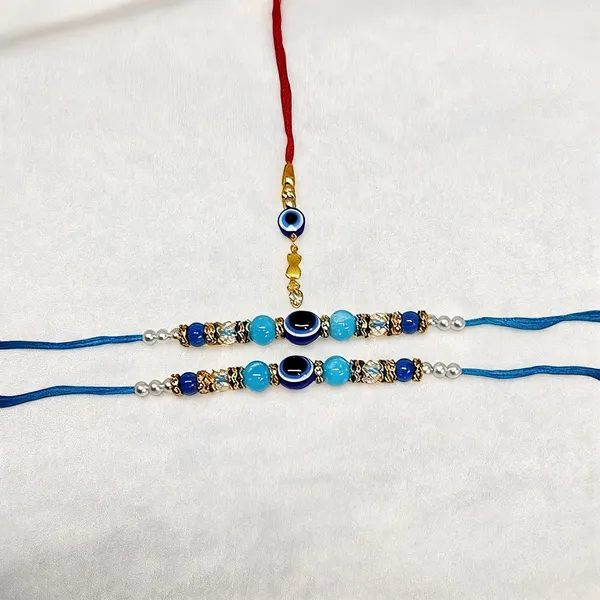 Blue_And_Red_Rakhi,_Lumba,_Bracelet,_Chawal_Roli_Pack_Alloy_For_Brother_And_Sister-In-Law_Pack_Of_2