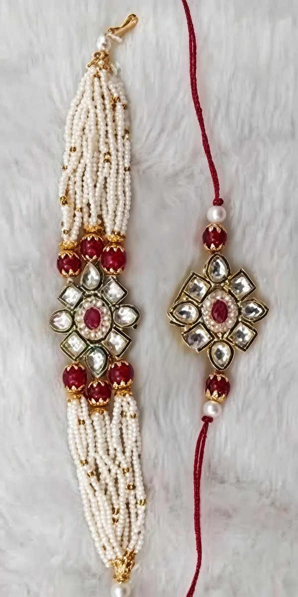 Red_And_White_Rakhi,_Lumba,_Bracelet,_Chawal_Roli_Pack_Alloy_For_Brother_And_Sister-In-Law_Pack_Of_2