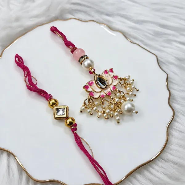 Pink_And_White_Rakhi,_Bracelet_Alloy_For_Brother_And_Sister-In-Law_Pack_Of_2