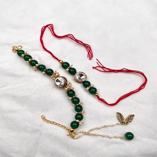 Green_And_White_Rakhi,_Lumba,_Bracelet,_Chawal_Roli_Pack_Alloy_For_Brother_And_Sister-In-Law_Pack_Of_1