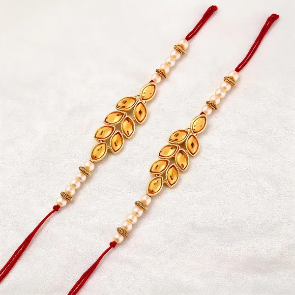 Golden_And_White_And_Red_Rakhi,_Lumba,_Bracelet,_Bluetooth_Rakhi,_Chawal_Roli_Pack_Alloy_For_Brother_And_Sister-In-Law_Pack_Of_2