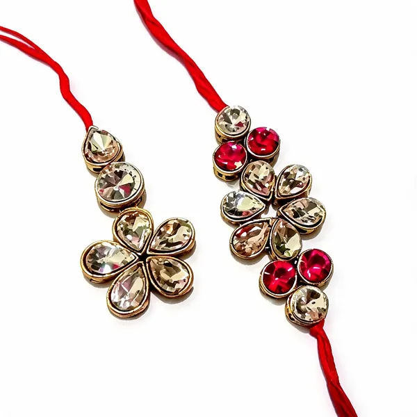 White_And_Dark_Pink_Rakhi_Alloy_For_Brother_And_Sister-In-Law_Pack_Of_2