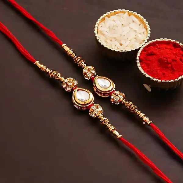 White_Rakhi,_Chawal_Roli_Pack_Alloy_For_Brother_And_Sister-In-Law_Pack_Of_2
