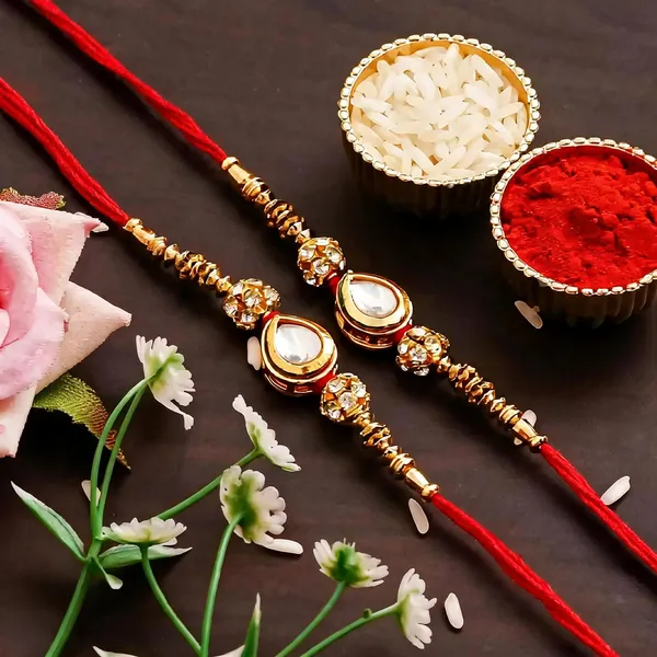 White_Rakhi,_Bracelet,_Chawal_Roli_Pack_Alloy_For_Brother_And_Sister-In-Law_Pack_Of_2