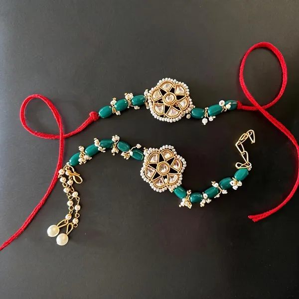 White_And_Green_Rakhi,_Lumba_Alloy_For_Brother_And_Sister-In-Law_Pack_Of_2