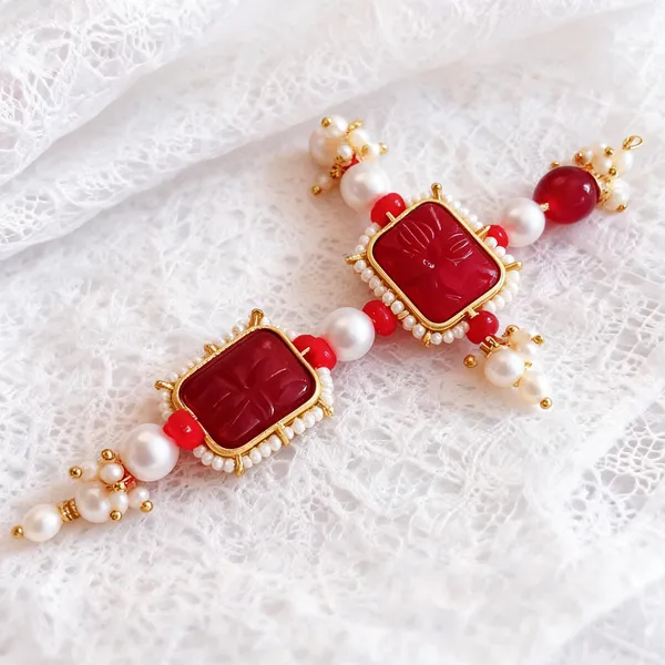 Maroon_Rakhi,_Bracelet_Alloy_For_Brother_And_Sister-In-Law_Pack_Of_2