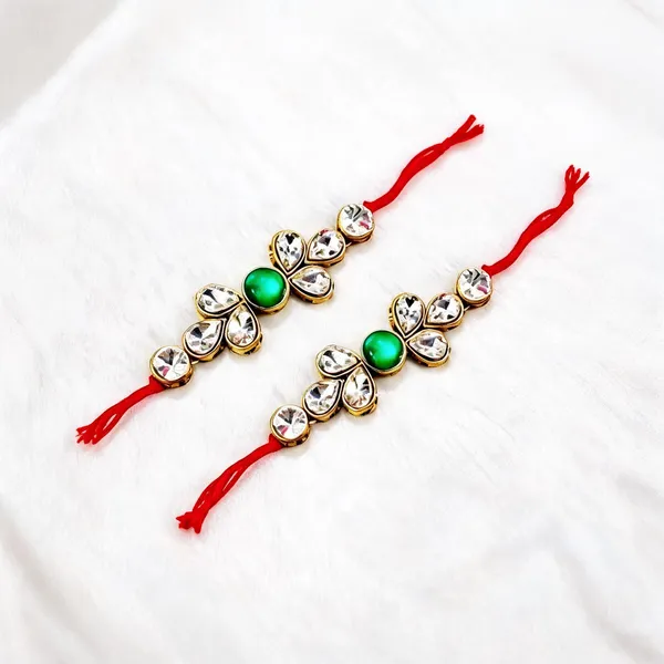 Green_And_White_Rakhi,_Bracelet,_Chawal_Roli_Pack_Alloy_For_Brother_And_Sister-In-Law_Pack_Of_2