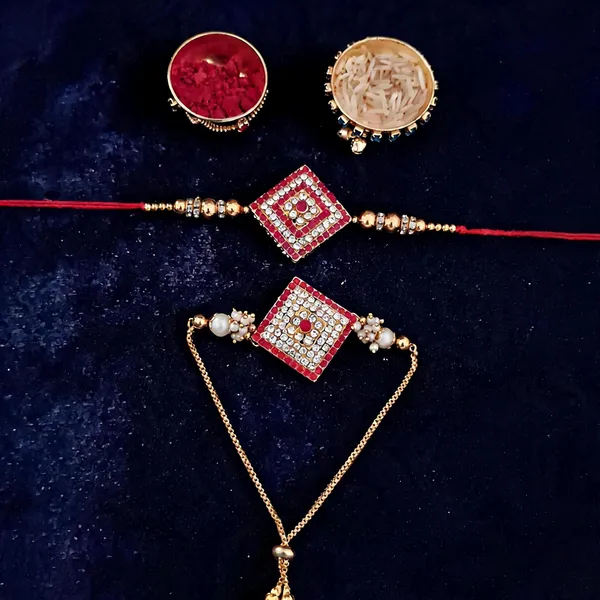 Red_And_Gold_Rakhi,_Bracelet,_Chawal_Roli_Pack_Alloy_For_Brother_And_Sister-In-Law_Pack_Of_2