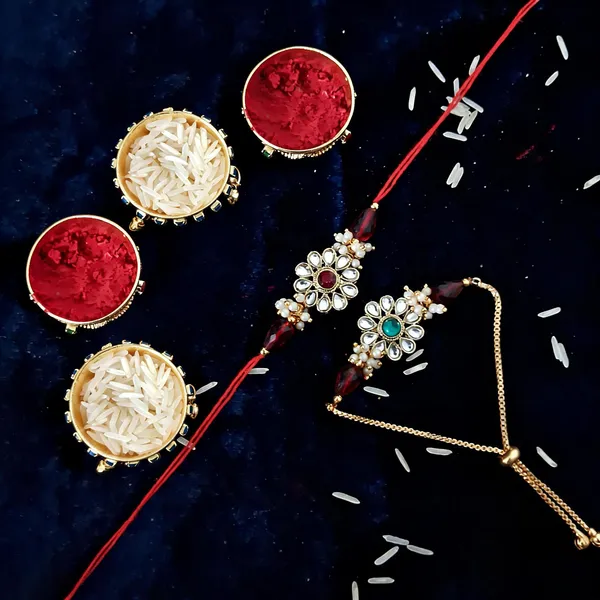 Red_And_White_Rakhi,_Bracelet,_Chawal_Roli_Pack_Alloy_For_Brother_And_Sister-In-Law_Pack_Of_2