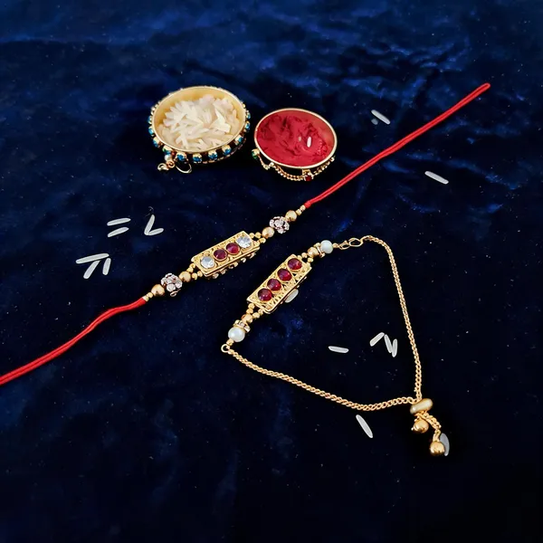 Red_And_White_Rakhi,_Lumba,_Bracelet,_Bluetooth_Rakhi,_Chawal_Roli_Pack_Alloy_For_Brother_And_Sister-In-Law_Pack_Of_2