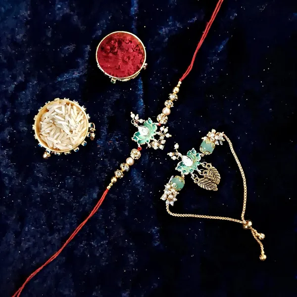 Lion_Green_And_White_Rakhi,_Lumba,_Bracelet,_Bluetooth_Rakhi,_Chawal_Roli_Pack_Alloy_For_Brother_And_Sister-In-Law_Pack_Of_2