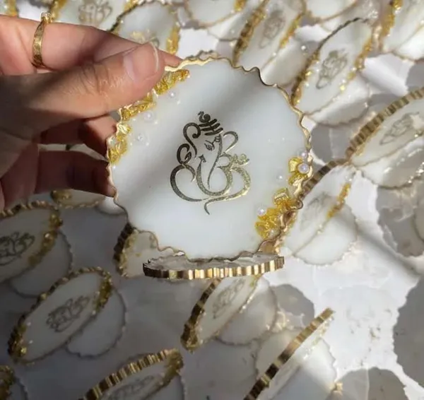 Decorative_Ganesha_Dashboard_Idol_With_Gold_-_White_Marble_Finish