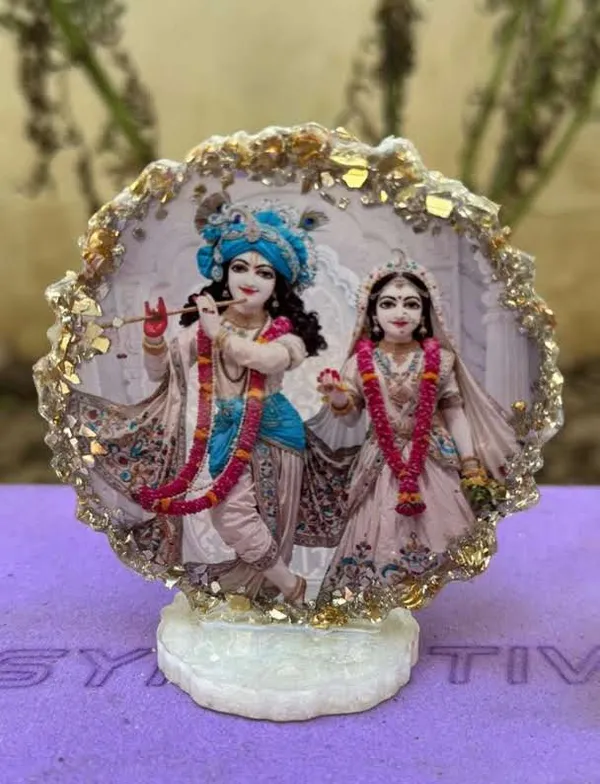 Radha_Krishna_Divine_Idol_-_Decorative_Showpiece_With_Golden_Frame_And_Crystal_Base