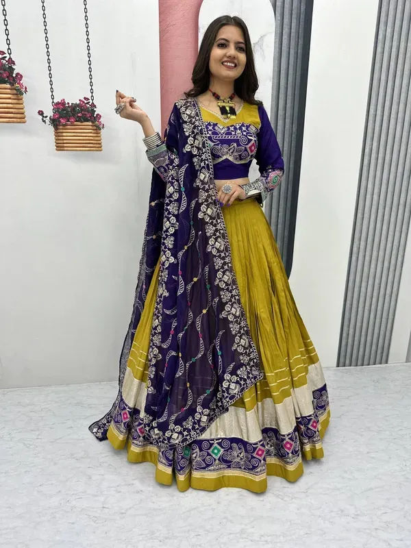 Yellow_And_Blue_Heavy_Lichi_Fabric_And_Jacquard_Silk_Patola_Print_Lehenga_Choli_For_Women