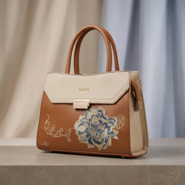 Cheryi_Tan_Brown_Handbag_With_Embroidered_Flap_Detail
