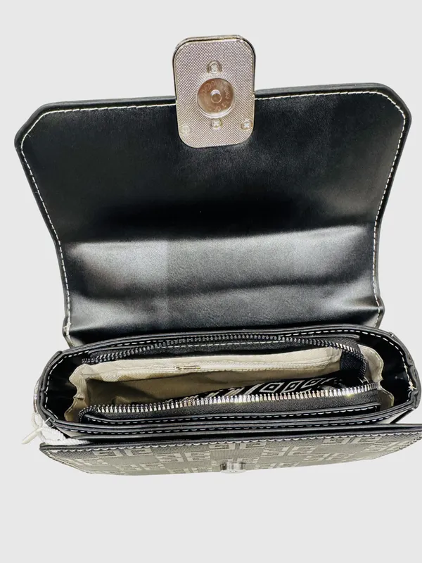 Black_Textured_Sling_Bag_With_Metallic_Buckle_Closure