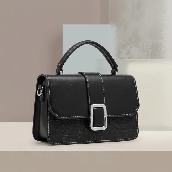 Black_Textured_Sling_Bag_With_Metallic_Buckle_Closure