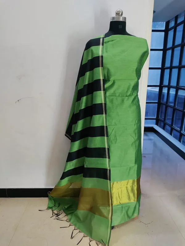 pista_And_Black_cotton_Silk_Premium_And_Elegant_Dress_Material_For_Women